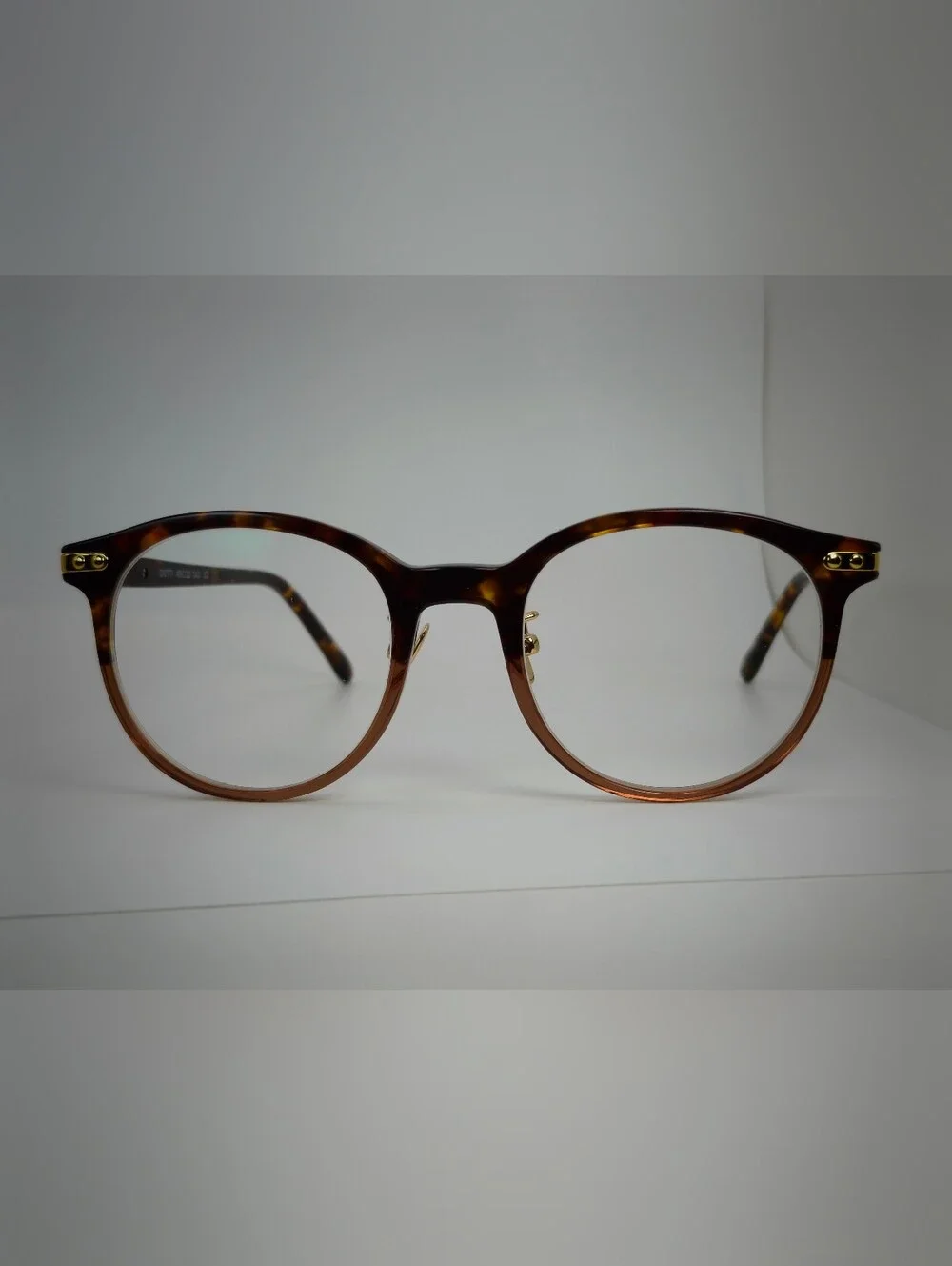 Dotti. Smoke Under Tortoiseshell Upper.  Eyeglasses - Brown Amber. Gold